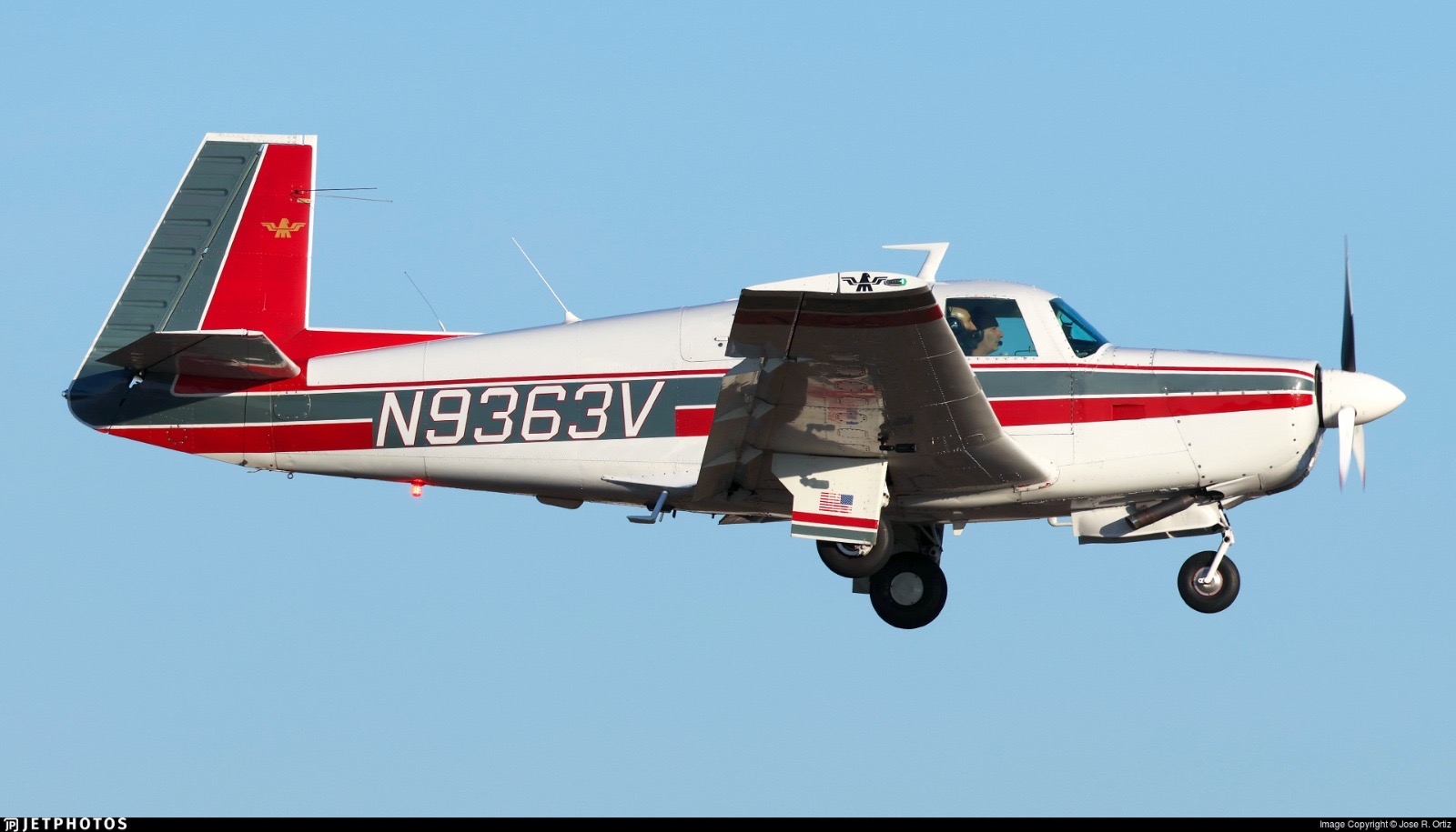 N9363V, a Mooney M20F, air-to-air in clean sky