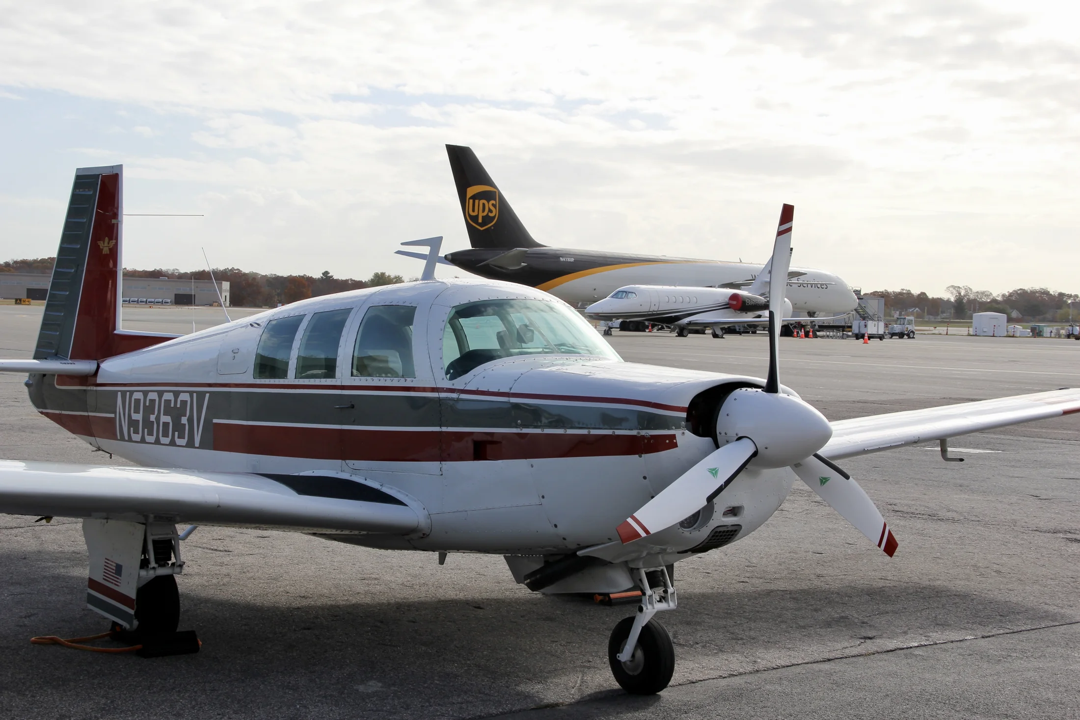 N9363V, a 1970 Mooney M20F, parked on the ramp at Essex County Airport