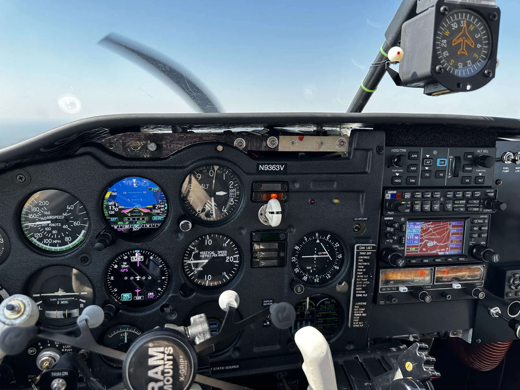 The N9363V panel in flight, GI 275 showing synthetic vision and the autopilot engaged in level mode